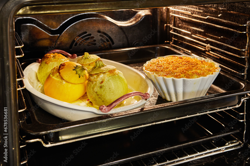 Canvas Prints Stuffed zucchini and pie are baked in an electric oven