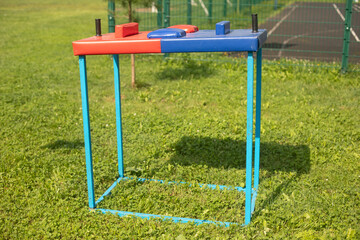Arm wrestling machine. Sports equipment for arm strength training. Equipment at the wrestling tournament.