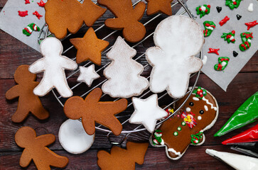 Christmas gingerbread cookies ready to be decorated with colored royal icing