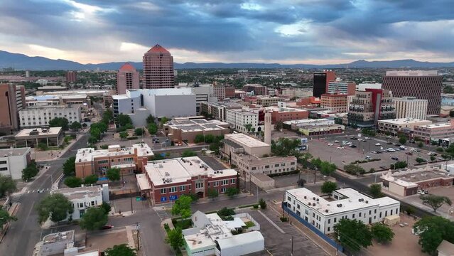 Downtown Albuquerque, New Mexico during sunrise. Aerial establishing shot.