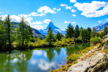 View of Grindji Lake (Grindjisee) and Matterhorn mountain at summer on Five-lake trail in Zermatt, Switzerland