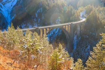 Papier Peint photo Viaduc de Landwasser View of Wiesen Viaduct, Rhaetian railway, Graubunden in Switzerland at winter