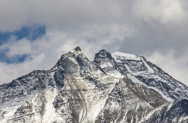 Fototapeta na wymiar snow covered mountain peaks