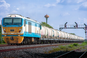Fototapeta na wymiar Locomotive with Tanker-freight train on the railway.