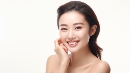Beautiful face Portrait of a smiling woman stroking her healthy skin On a white background, a beautiful joyful girl model with fresh glowing moisturized facial skin and natural makeup.