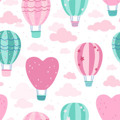 Seamless pattern with hot-air balloons flying in the sky. Vector background. Texture for print, textile, fabric.