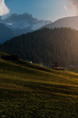 majestic view of Gulmarg, Kashmir, India at sunset. The meadow only be seen on the summer during June until October. Gulmarg is famous as a ice sport places during the winter. 