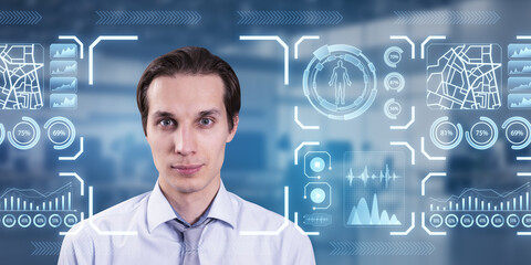 Portrait of attractive pensive man with glowing face recognition hologram on blurry office interior background. Scanning and personal safety concept.