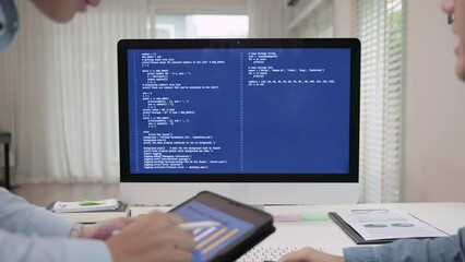 Smart AI cyber bot deep tech tools help write prompt code screen. Asia people asian man IT team typing busy talking work on predict big data center office reskill upskill STEM expert skill job course.