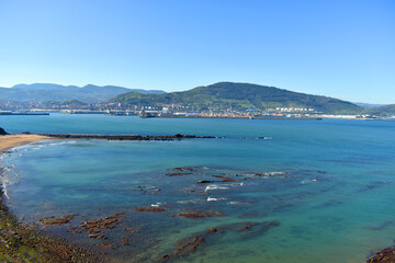 Arrigunaga beach in Getxo. In the background, Santurce / Santurtzi. Bizkaia. Basque Country. Spain