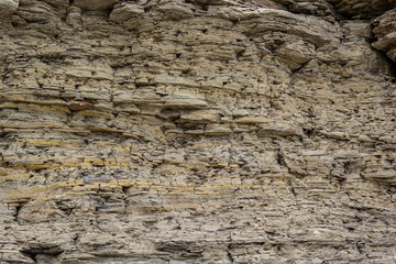Most of the rocks exposed at the surface of Earth are sedimentary rock. Sedimentary rocks are formed particle by particle and bed by bed, and the layers are piled one on top of the other