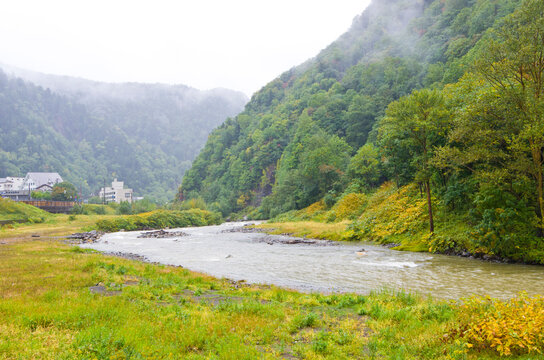 Ishikari river flows through Sounkyo village in Hokkaido prefecture, Japan.
