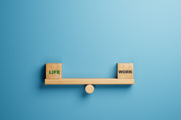 balance between life and work concept. life and work words balancing on wooden seesaw - obrazy, fototapety, plakaty