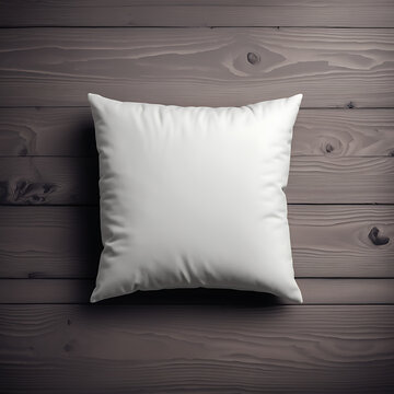 blank white square cushion in a flat-lay mockup on a grey wooden background.