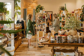 Friends shopping together in zero waste shop