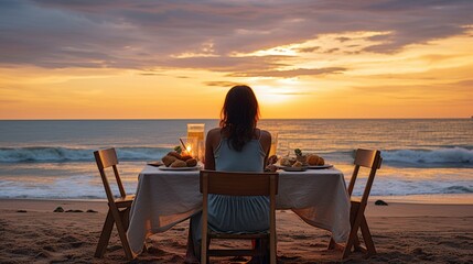 Woman sitting alone, her waiting husband on table set for a romantic meal on beach sky and ocean