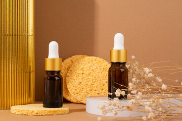 Mockup of amber glass dropper bottle and natural cosmetics composition