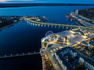 Night aerial view of Cheboksary cityscape on banks of Volga River, Chuvashia, Russia