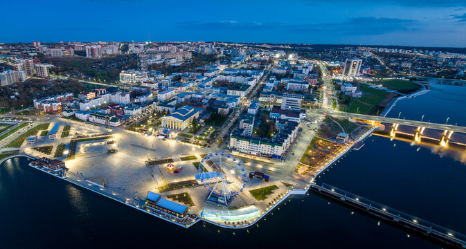 Night aerial view of Cheboksary cityscape on banks of Volga River, Chuvashia, Russia