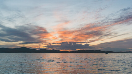 Beautiful purple sunset with the mountains in the background