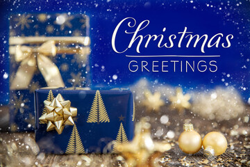 Text Christmas Greetings, Christmas Presents, Gold, Blue Winter Decoration © Nelos