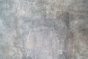 High angle shot of a weathered grey concrete floor.