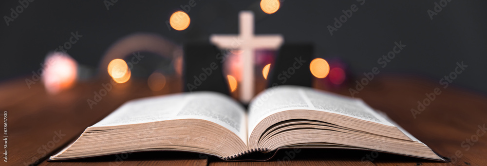 Wall mural holy bible with cross on bokeh background - Wall murals