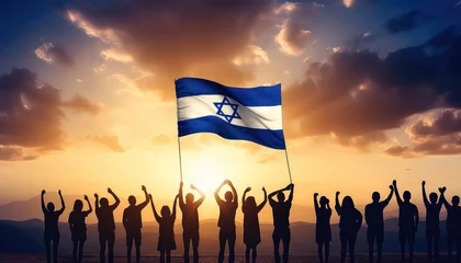Fotobehang Group of people with israeli flag on sunset background © terra.incognita