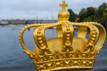 Fototapeta na wymiar Stockholm, Sweden: Gilded Crown on Skeppsholmsbron bridge