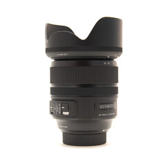 Camera lens with hood to reduce flares made in Japan for DSLR full frame camera photography...