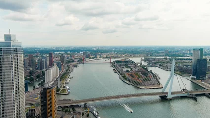 Papier Peint photo autocollant Pont Érasme Rotterdam, Netherlands. Erasmus Bridge. Noordereiland Island. View of the city center. River Nieuwe Maas. Summer day, Rainy clouds, Aerial View
