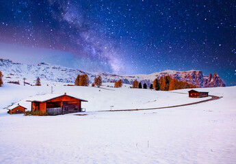 amazing winter landscape with snow at sunrise in Alpe di Siusi. Dolomites  Italy - winter holidays...