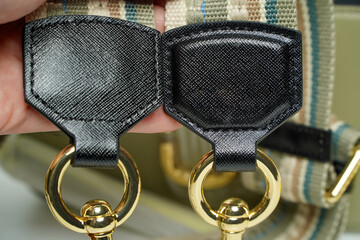 Carabiner for leather goods. Metal snap hook for bag handles, double carabiner lock on a leather...