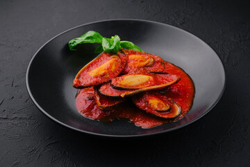 Cooked Mussels with hot spiced sauce