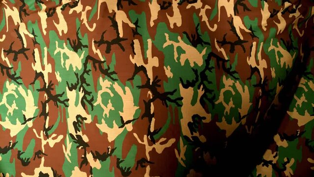 Camouflage pattern military abstract motion background seamless loop