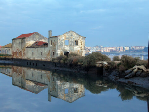 Old ruined Tide Mill and water mirror at Seixal Bay. Being centuries old, it&rsquo;s one of the surviving Tide-Mills in Europe.