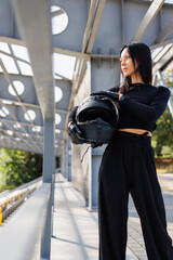 Mystery and Style: Woman in Black with Helmet