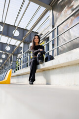 Biker Glamour: Stylish Woman in Black Ensemble