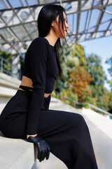 Brunette woman in Black Outfit
