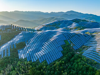Aerial photography of photovoltaic panels on the mountain