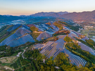 Aerial photography of photovoltaic panels on the mountain