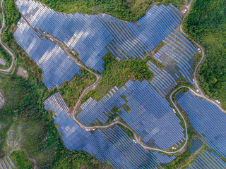 Aerial photography of photovoltaic panels on the mountain