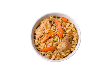 Delicious Uzbek pilaf with chicken, carrots, barberry, spices and herbs