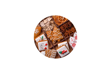 Beautiful Christmas gingerbread cookies of different colors on a ceramic plate