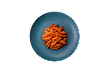 Delicious crispy sweet potato fries with salt, spices and herbs