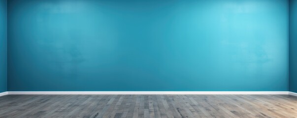 empty clean room with blue wall and wooden floor