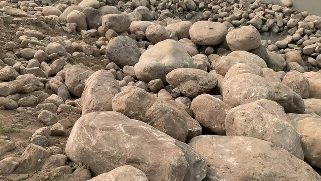 Sindh River view in punjab pakistan. Rocks in stream with smooth flowing water. beautiful natural view of sindh river. 