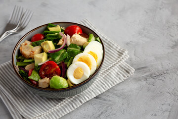 Homemade Honey Mustard Chicken Salad in a Bowl, side view. Copy space.
