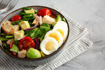 Homemade Honey Mustard Chicken Salad in a Bowl, side view. Space for text.