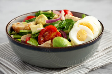 Homemade Honey Mustard Chicken Salad in a Bowl, side view. Close-up.